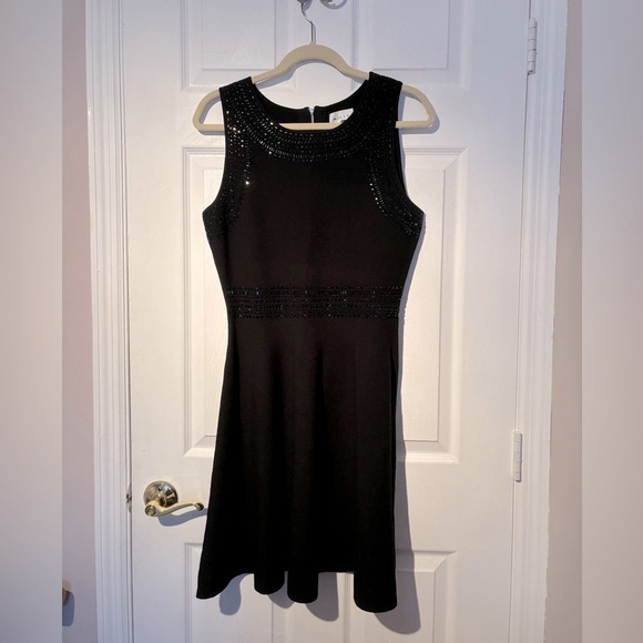 Black Knitted Dress with embroidered beads. - Picture 1 of 9
